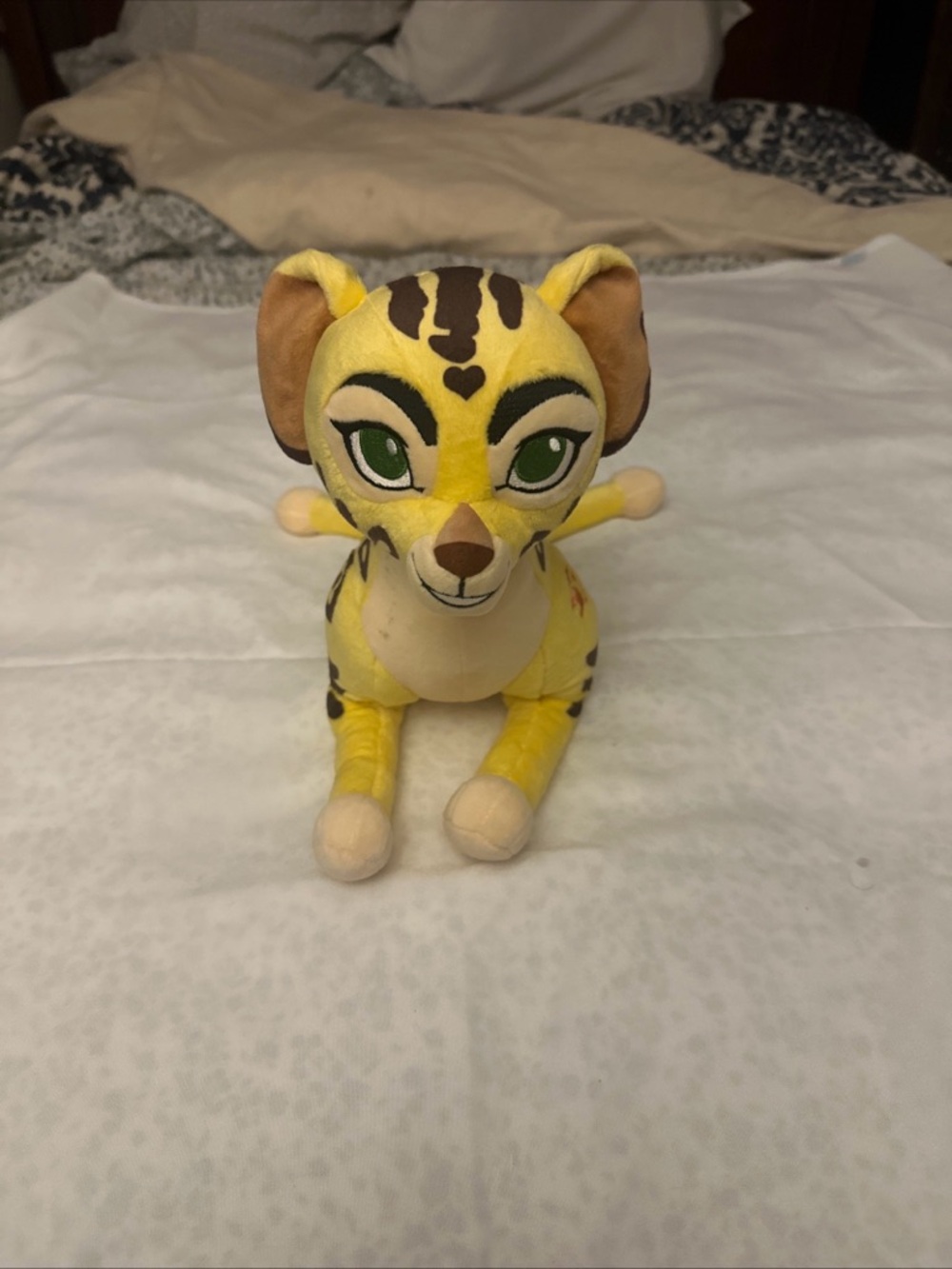 Disney Yellow Plush with Brown Stripe Details
